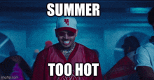 a man wearing a red jersey and a white hat with the words summer too hot