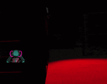 a dark room with a red carpet and a drawing of a robot that says ' god ' on it