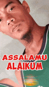 a man in a green shirt with the words assalamu alaikum on the bottom