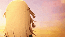 a girl with long blonde hair is looking at the sun