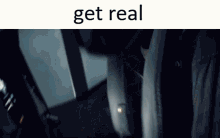 a screenshot of a video with the words get real on the bottom