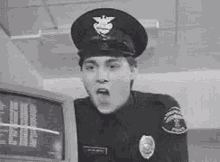 Police Chewing Gum GIF - Police Chewing Gum Nodding GIFs
