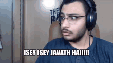 a man wearing headphones and glasses is saying isey isey javath hai !!!