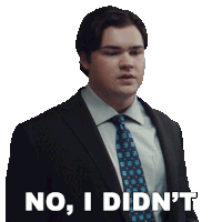 a man in a suit and tie is saying no i didn 't