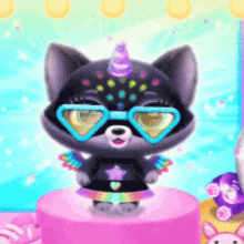 a cartoon cat with a unicorn horn and sunglasses