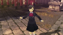 a girl in a black uniform with a red bow is standing on a brick walkway