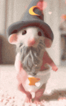 a mouse wearing a wizard hat and a diaper