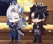 jaxx and vio are standing next to each other