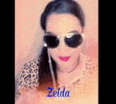 a woman wearing sunglasses has the name zelda written on the bottom