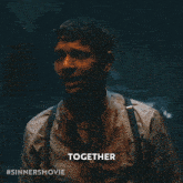 a man with suspenders and a shirt that says together on it