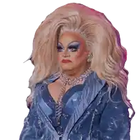 a drag queen with a very large blonde wig