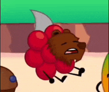 a cartoon character with a bear 's head and arms is sitting on a table .