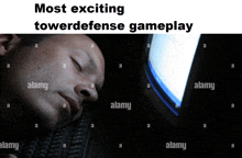 a man sleeping in front of a computer with the words most exciting towarddefense gameplay