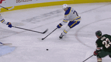 a hockey player with the number 25 on their back