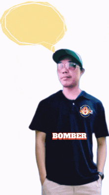 a man wearing a black shirt that says bomber on the front