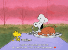 a cartoon of snoopy and woodstock sitting at a table with a turkey