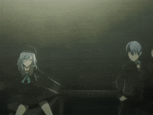 a boy and a girl are dancing together in a dark room