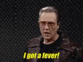 a man wearing sunglasses and a leather jacket says is more all .