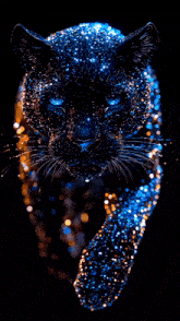a black panther covered in blue and gold glitter is walking in the dark