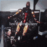 a statue of iron man with the words bro is everywhere above him