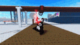 a person holding a sword in a video game with a wreath hanging from a bridge .