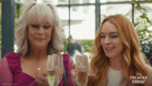 two women toasting with champagne in a freakier friday ad