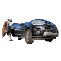 a man standing next to a black ford suv with its doors open