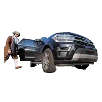 a man standing next to a black ford suv with its doors open