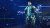 a man in a futuristic suit is holding a lightning bolt in his hand