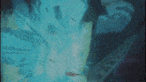 a blurry picture of a person with the word wha written on it