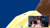 a man in a red shirt is playing a game