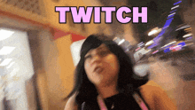 a blurry picture of a woman with the word twitch written on it
