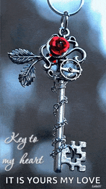 a key with a red rose and the words " key to my heart it is yours my love " below it