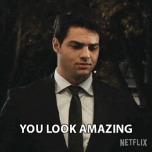 a man in a suit and tie says you look amazing netflix