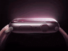 a bunch of apple watches are lined up on a table