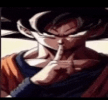 a close up of a dragon ball z character holding his finger to his mouth .