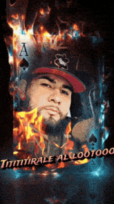 a man wearing a hat with the letter a on it stands in front of a flaming ace of spades card