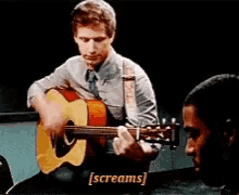 Yes Playing Guitar GIF - Yes Playing Guitar Screams GIFs