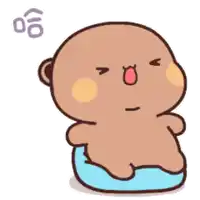 a cartoon bear is sitting on a blue pillow with chinese writing behind it