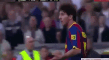 a soccer player wearing a jersey with the number 3 on the back