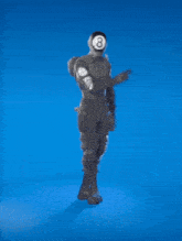 a soldier with a ball on his head is dancing in front of a blue background