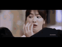 a close up of a woman making a funny face