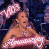 a woman wearing a crown that says ' v103 ' on it