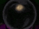 a pixelated image of a woman 's face looking through a lens