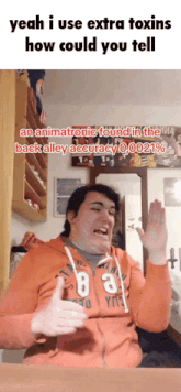 a man in an orange hoodie is giving a thumbs up with the caption yeah i use extra toxins how could you tell