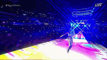 a wrestling match is being broadcast live on a television screen