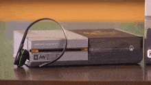 a sentinel task force video game console with a headset attached to it