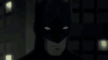 a close up of a man 's face with a caption that says i 'm batman