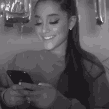 Ariana Grande Laughing Phone GIF - Ariana Grande Laughing Phone Tbygui GIFs