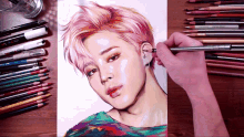 a drawing of a girl with pink hair is surrounded by colored pencils and markers